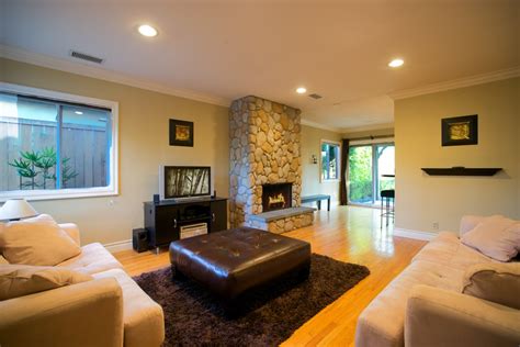 The focal point of a. Living Room Remodel with Cultured Stone Veneer - TPG ...