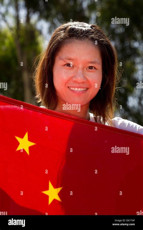 jan 28 2011 melbourne australia na li of china poses with the chinese flag the day before