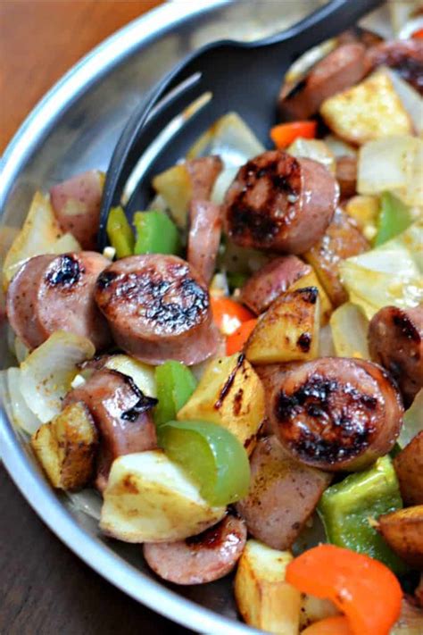 Drop in sliced potatoes and fry for 15 minutes, turning as needed. Skillet Sausage and Potatoes | Small Town Woman
