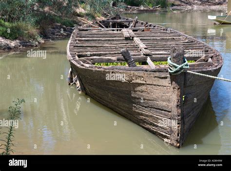 An Old Wrecked Hull Of A River Barge On The River Murray Stock Photo