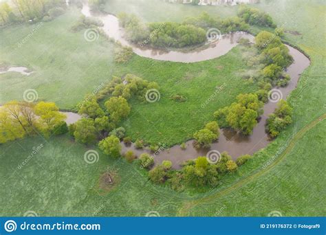 Aerial View Of River Meander In The Lush Green Vegetation Of The Delta