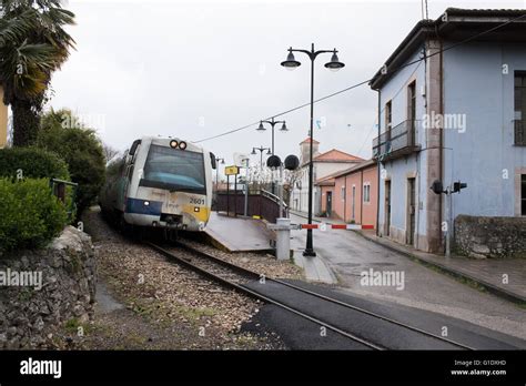 A Spanish narrow-gauge train at Poo station, Asturias, Northern Spain
