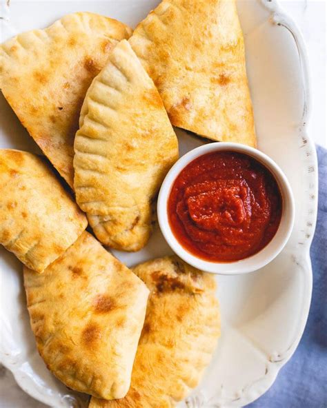 This Easy Calzone Recipe Features A Homemade Pizza Dough And A Spinach