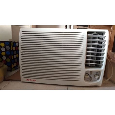 It allows you to set the desired temperature and the timer. 1.5 hp Condura window type aircon second hand air con air ...