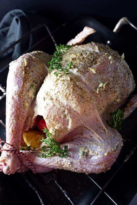 Roast turkey about 4 1/4 hours, or until a thermometer inserted into the thickest part of the thigh registers 175 degrees. Mayo-Rubbed Turkey with Lemon and Herbs | Recipe ...