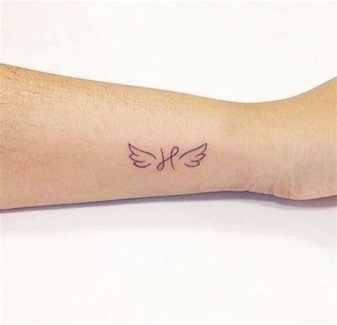 Angel Smalltattoos Wing Tattoos On Wrist Dainty Tattoos Hand