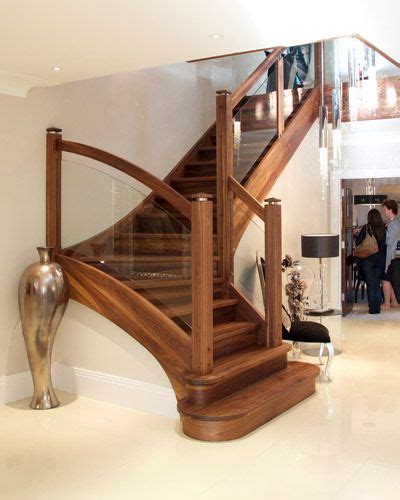 Let light flood into dark halls. Warm Walnut with Cool Glass = Clean Lines of a Beautiful ...
