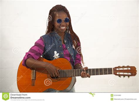Beautiful African Woman Playing Guitar Stock Photos