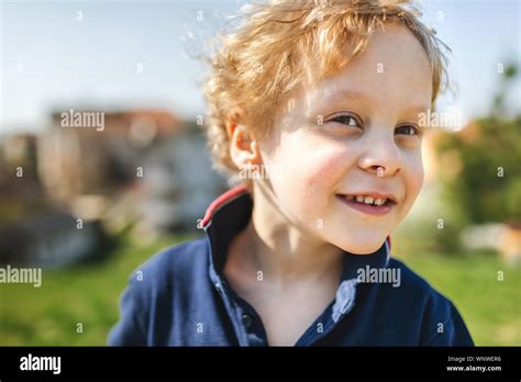 Portrait Of Young Boy Smiling Stock Photo Alamy