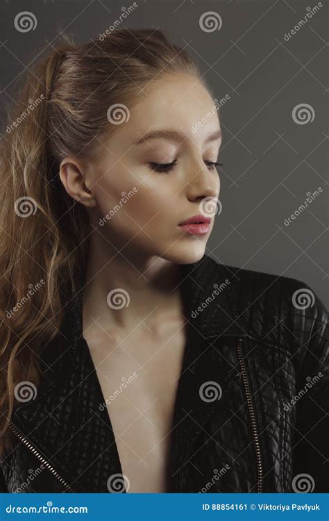 Attractive Young Model Posing For Model Tests In Leather Jacket Stock