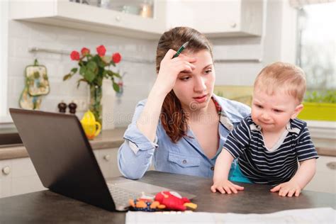 Young Mother Working With Her Baby Stock Image Image Of Child Home