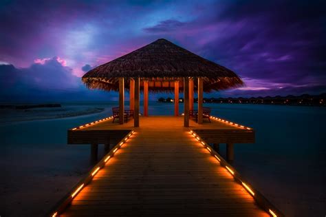 Maldives Sunset Sun Bungalows Ocean Lights Landscape Wallpaper