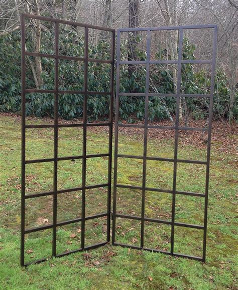 Trellis fence and trellis panels are ideal for providing a stable support to climbing plants whilst also adding colour and subtle privacy to your outdoor space. metal trellis ideas - Metal Trellis to Support Climbers ...
