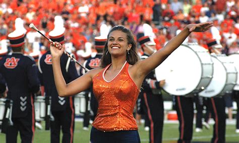 Watch Dozens Of Former Auburn Majorettes Pass The Baton To Pass The Time