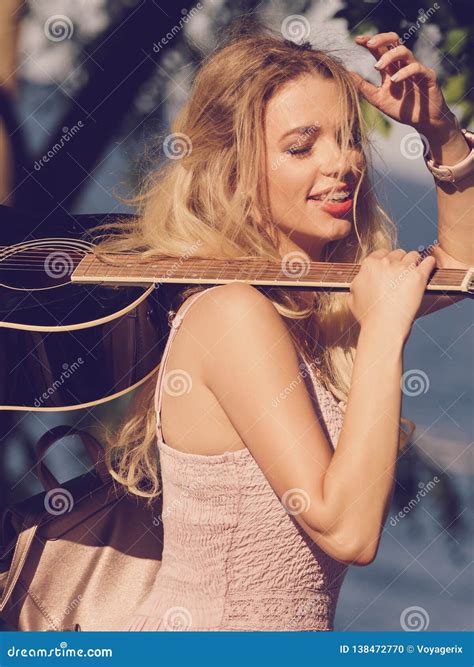 Woman Playing Acoustic Guitar In Park Stock Photo Image Of Singer
