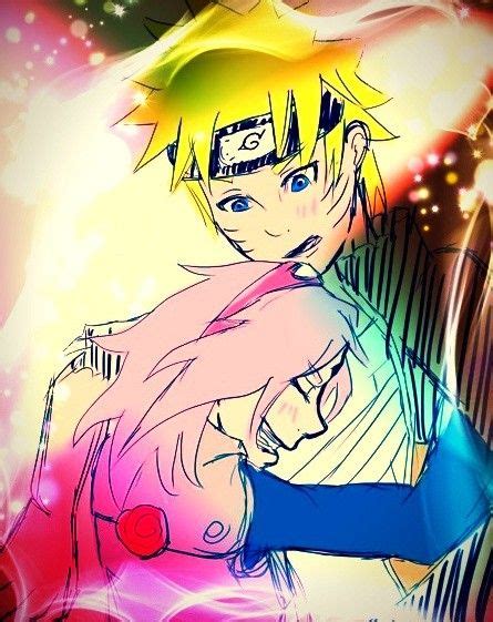 An Anime Character Hugging Another Character In Front Of A Colorful