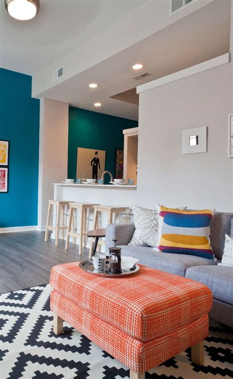 Bright Colors And Lots Of Natural Light Make This Open Concept Living