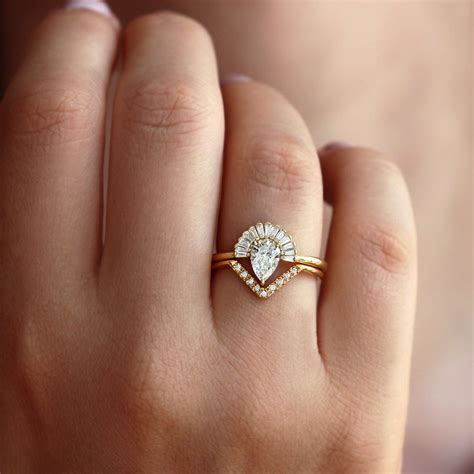 Pear Diamond Engagement Ring Set With Baguette Diamond Crown And Chevr