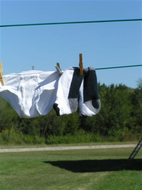 How To Hang Clothes On A Clothesline Easy Tips Pictures And Video