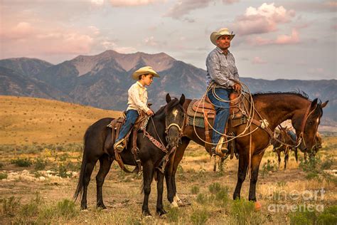 Father And Son Cowboys Photograph By Diane Diederich