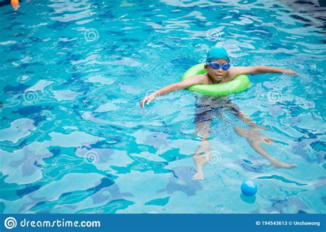 Boy Practicing Swimming In The Pool Stock Image Image Of Girl Float