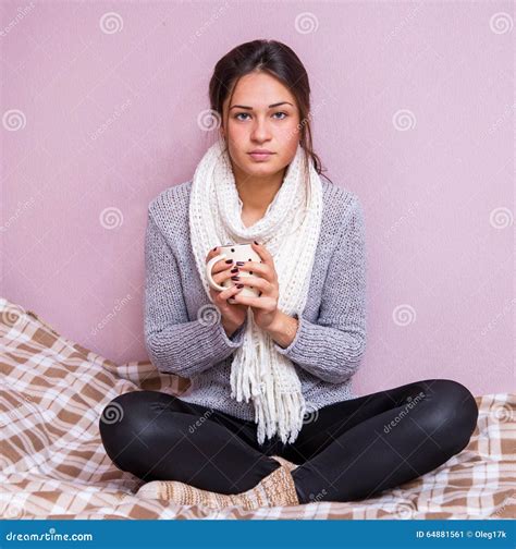 Cold Girl Lying On The Couch With A Thermometer Stock Image 79360549