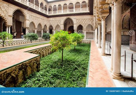 Green Courtyard Of Alcazar Example Of Mudejar Architecture Of The 14th