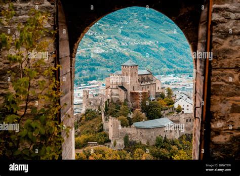 Medieval Valere Basilica Seen Through Main Gates Of Tourbillon Castle