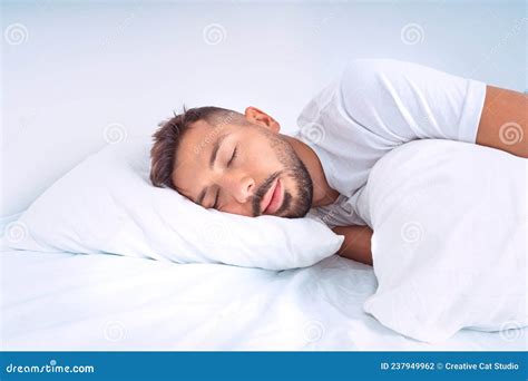 Handsome Cute Man Sleeping In The Bed With White Beddings Man Lying On