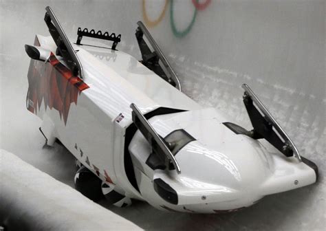 Canadian bobsled crashes in Olympic four-man heats ...