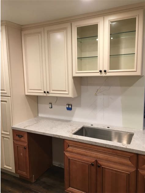 With a countertop added, the base cabinet rises to about 35 or 36 inches high. antique white upper cabinets and ginger glaze base ...