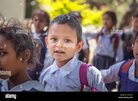 Happy Little Preschooler Boy Wearing School Uniform Standing During