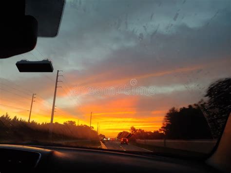 Sunrise Cloudy Sky Through Windshield Of The Car Stock Photo Image Of