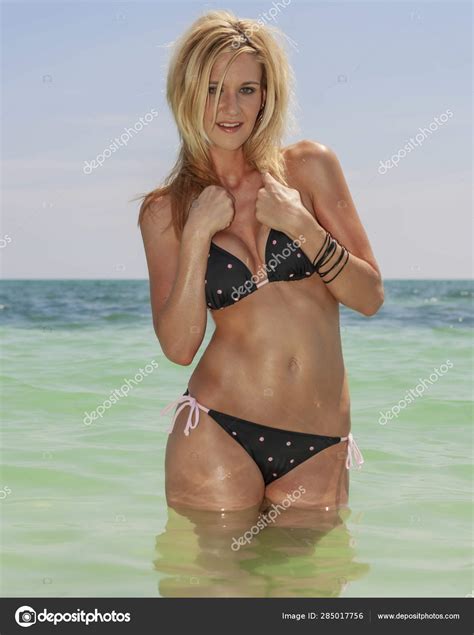 Lovely Blonde Bikini Model Posing Outdoors On A Caribbean Beach Stock Photo By Actionsports