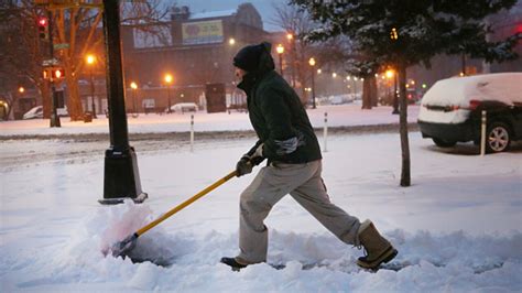 Heres How To Stay Safe While Shoveling Snow According To Michigan