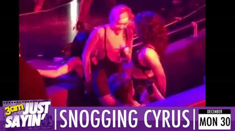 Miley Cyrus Kisses Sexy Dancer At Britney Spears Show Just Sayin