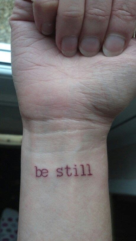 Be Still And Know I Am God Tattoo On Wrist In Pink Be Still