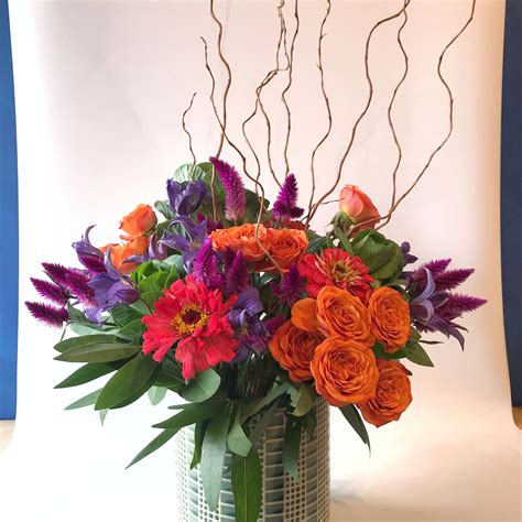 Check spelling or type a new query. summer conference front desk arrangement with red zinnias ...