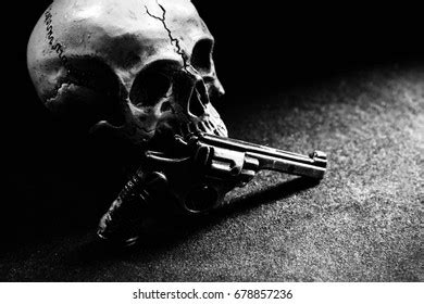 Skull Gun On Black Background Stock Photo Shutterstock