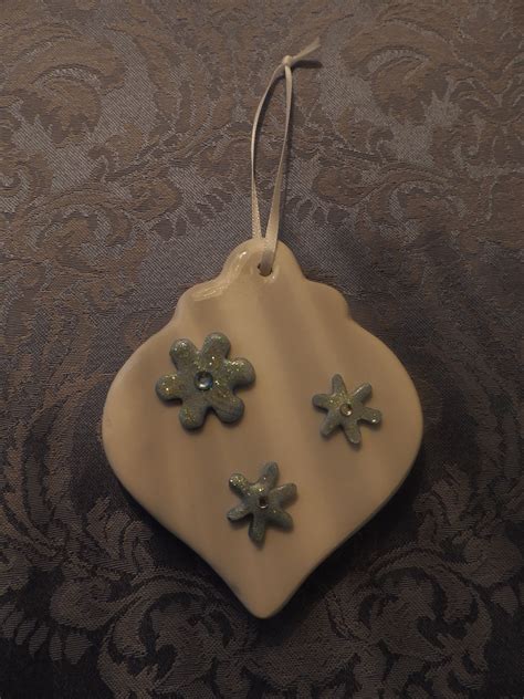 Ceramic ornament with polymer clay snowflakes. | Polymer clay snowflakes, Clay snowflakes ...