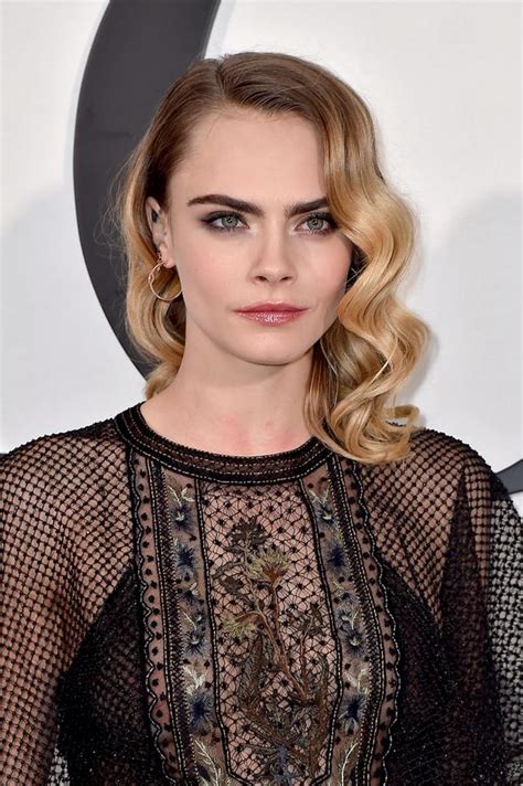 Cara Delevingne Wore A Sheer Lace Dress To Diors Fashion Show