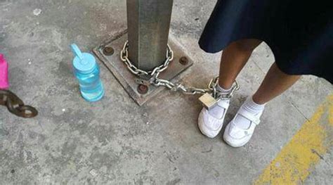 Disturbing Images Of Yr Old Girl Chained To A Post For Refusing To Go To School Go Viral