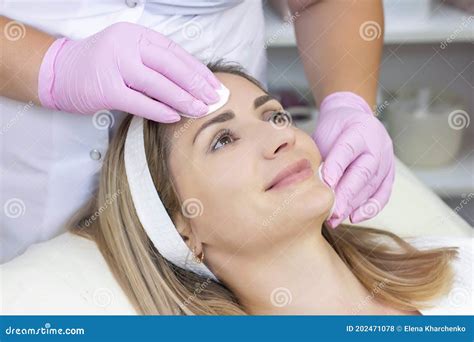 Cosmetology Young Woman With Receiving Facial Cleansing Procedure