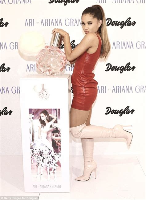 Ariana Grande Shows Off Her Derrière In Leather Mini And Sexy Thigh