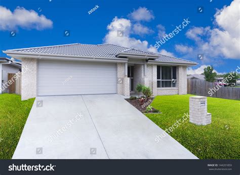 Modern Suburban House On Sunny Day Stock Photo 144201859 Shutterstock