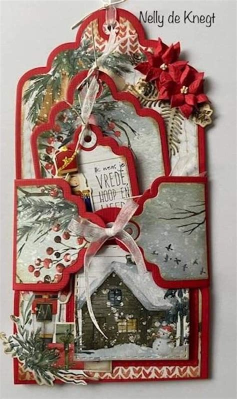 an altered christmas card with red and white paper