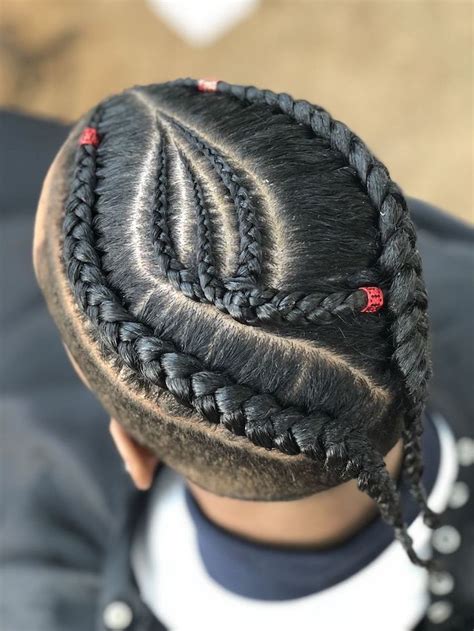 He, as many other artists, has an eccentric yet this article focuses on asap rocky braids and how you can enhance the style to look even better on this is one of asap rocky's signature looks. man with black hair, red beads, braids for boys, white t ...