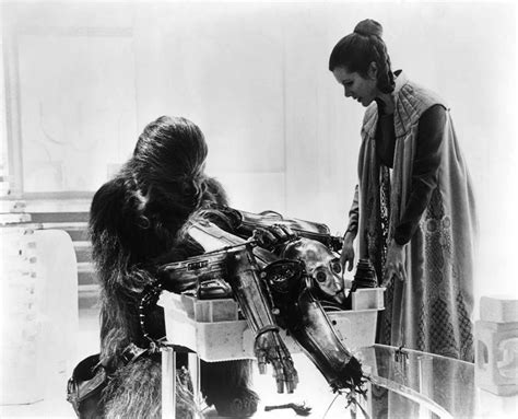 chewie and leia with broken up c3po on bespin esb 01 star wars cast