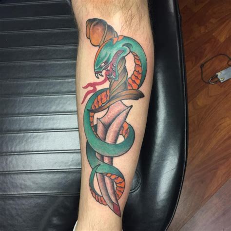 So, if you are inspired by the snakes and want one on your body, here are some amazing snake tattoos on leg to check. Snake And Dagger Tattoo Drawing Pictures | Drawing Skill