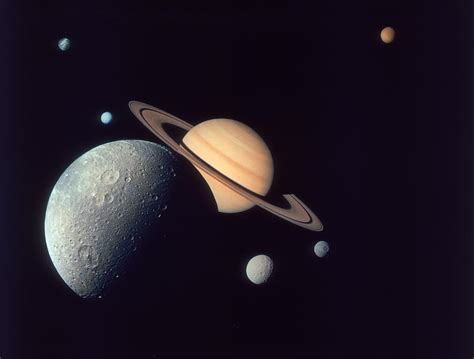Moons Of Saturn Photograph By Space Frontiers Fine Art America